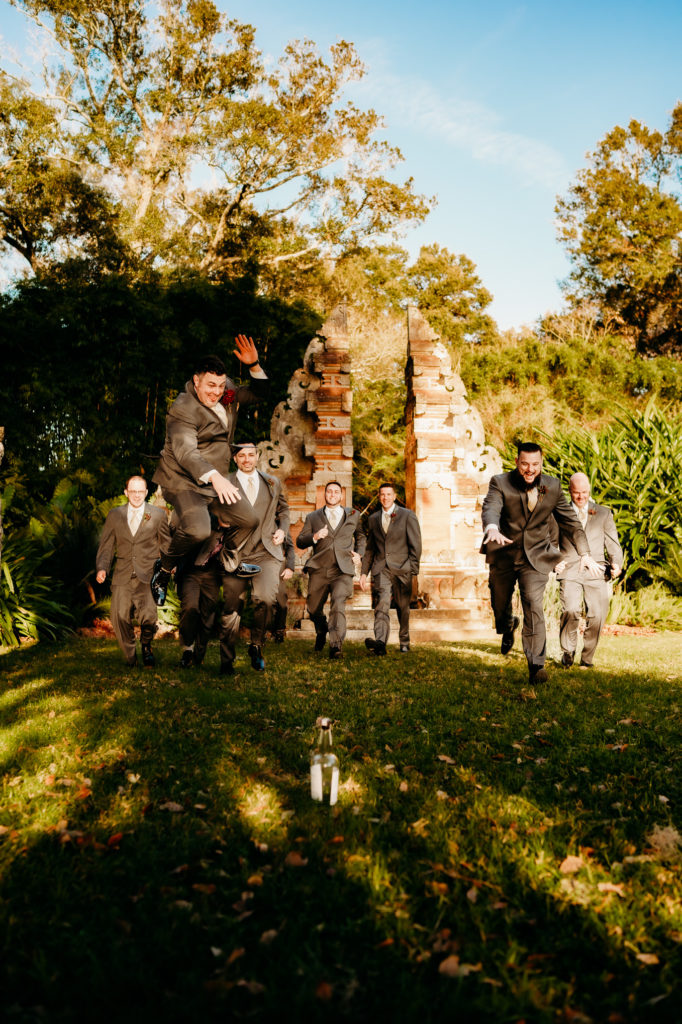 Wedding day groomsmen shot at Rip Van Winkle Gardens for a Louisiana Wedding