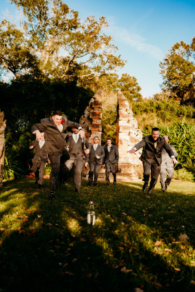Wedding day groomsmen shot at Rip Van Winkle Gardens for a Louisiana Wedding
